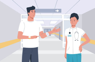 Doctor and patient in hospital hallway, patient with IV